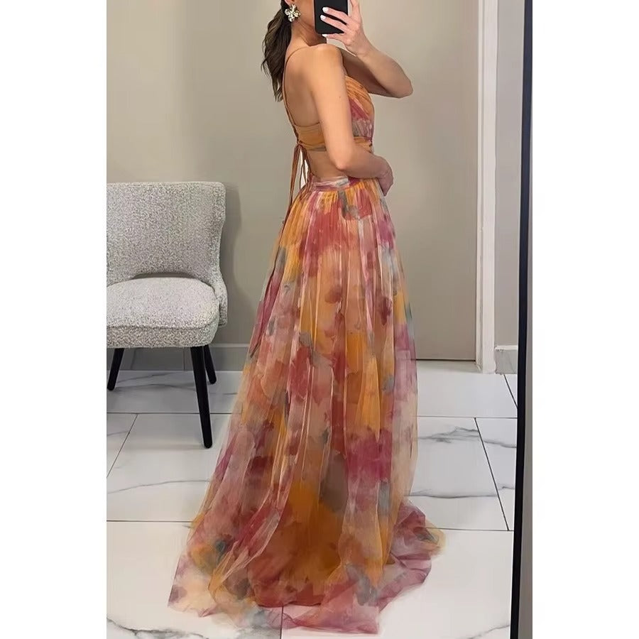 Stylish women's summer maxi dress with a delicate floral pattern, perfect for parties.