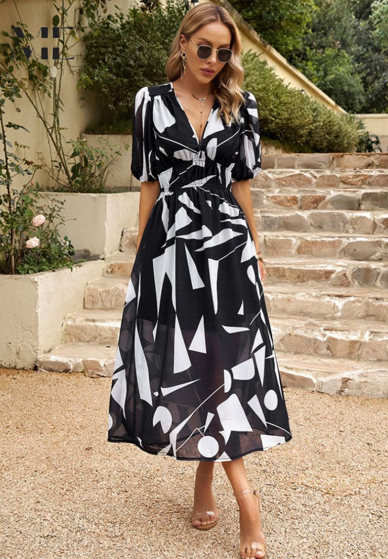 Make a statement in this elegant floral midi dress for women, featuring fashionable puff sleeves and V-neck.
