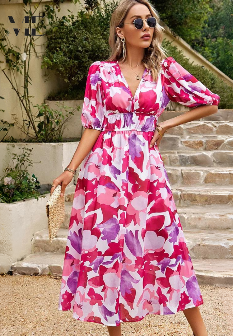 Women's stylish floral midi dress with puff sleeves & V-neck, ready for any elegant summer occasion.