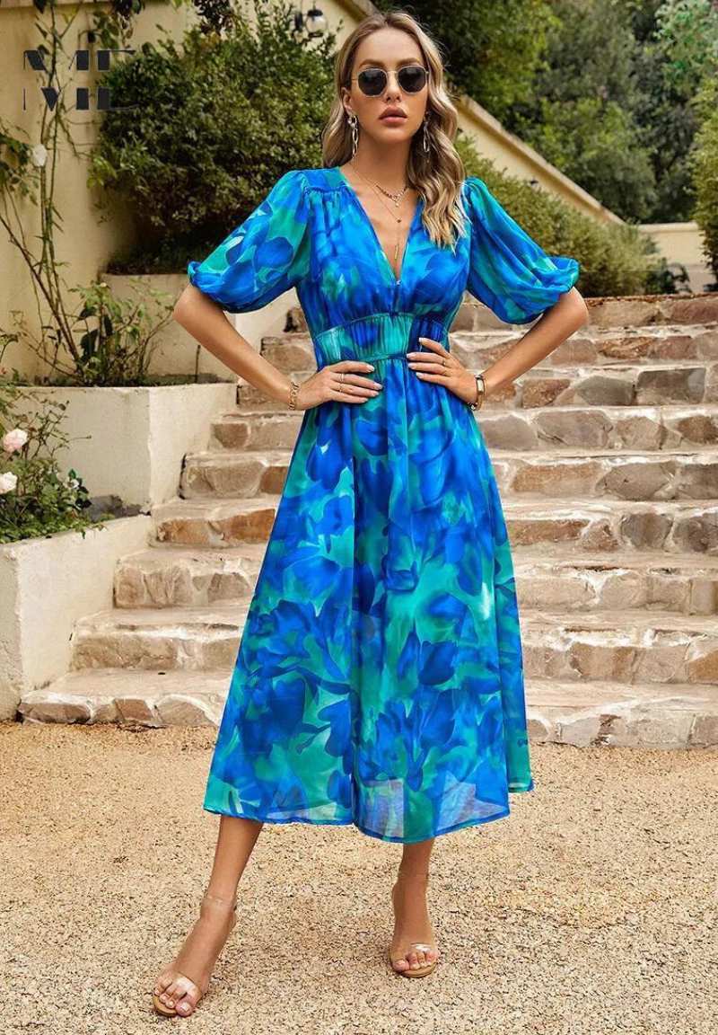 Classic women's midi dress: elegant floral print, feminine puff sleeves, and a chic V-neck for occasions.