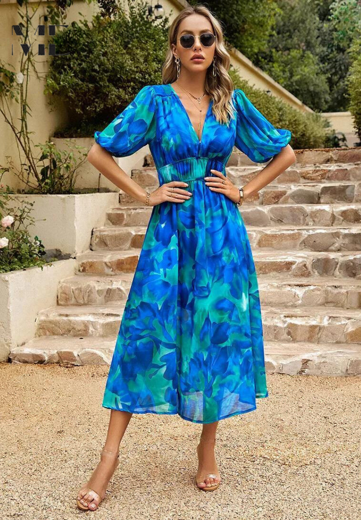 Classic women's midi dress: elegant floral print, feminine puff sleeves, and a chic V-neck for occasions.