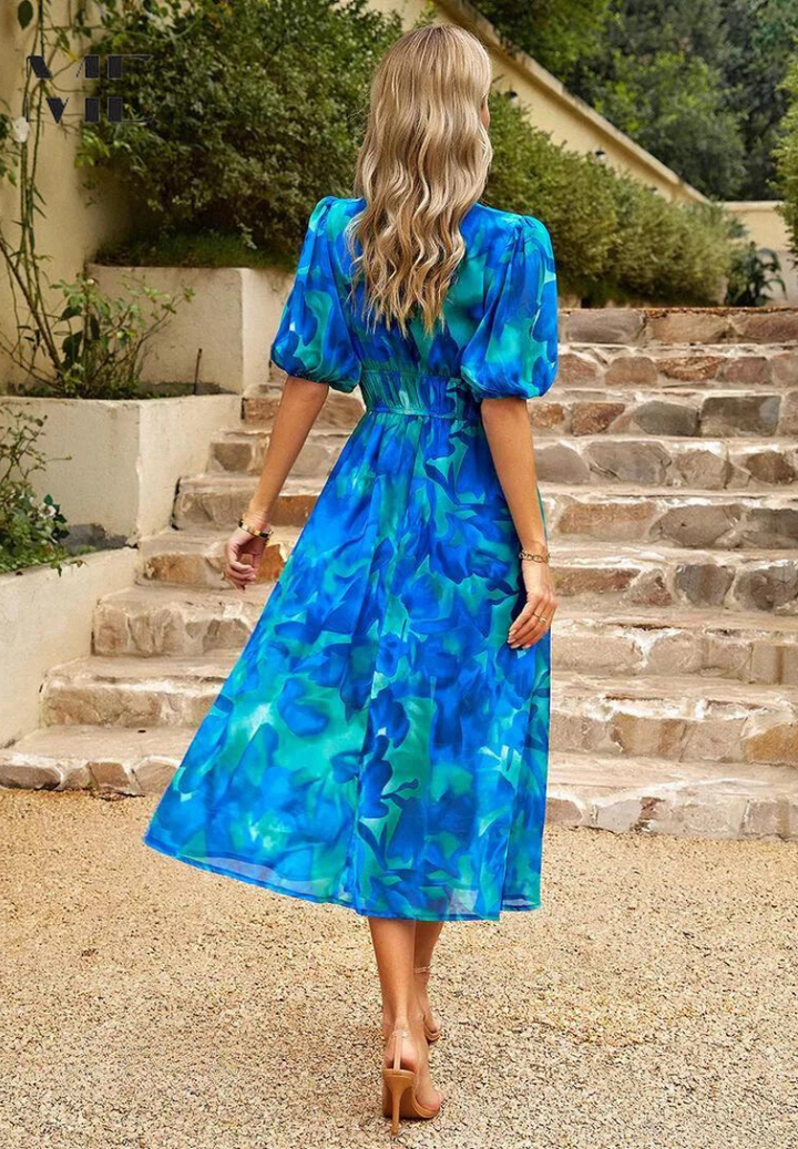 Versatile women's floral midi dress: elegant for parties, casual chic for day. Features puff sleeves & V-neck.