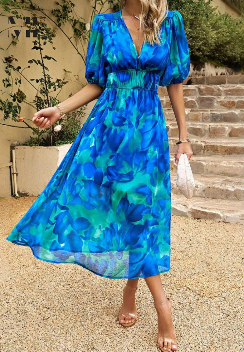 Light & airy floral midi dress for women, perfect for summer. Elegant puff sleeves and V-neck.