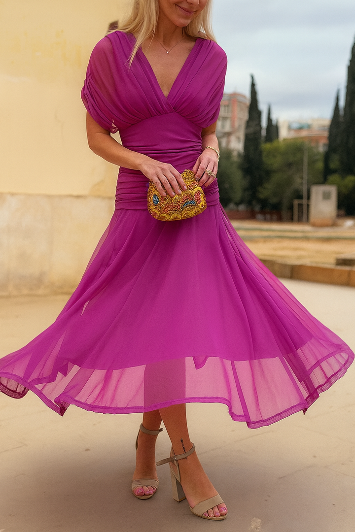 Ankle-length flowy mesh dress for women, featuring a stylish diagonal neckline.