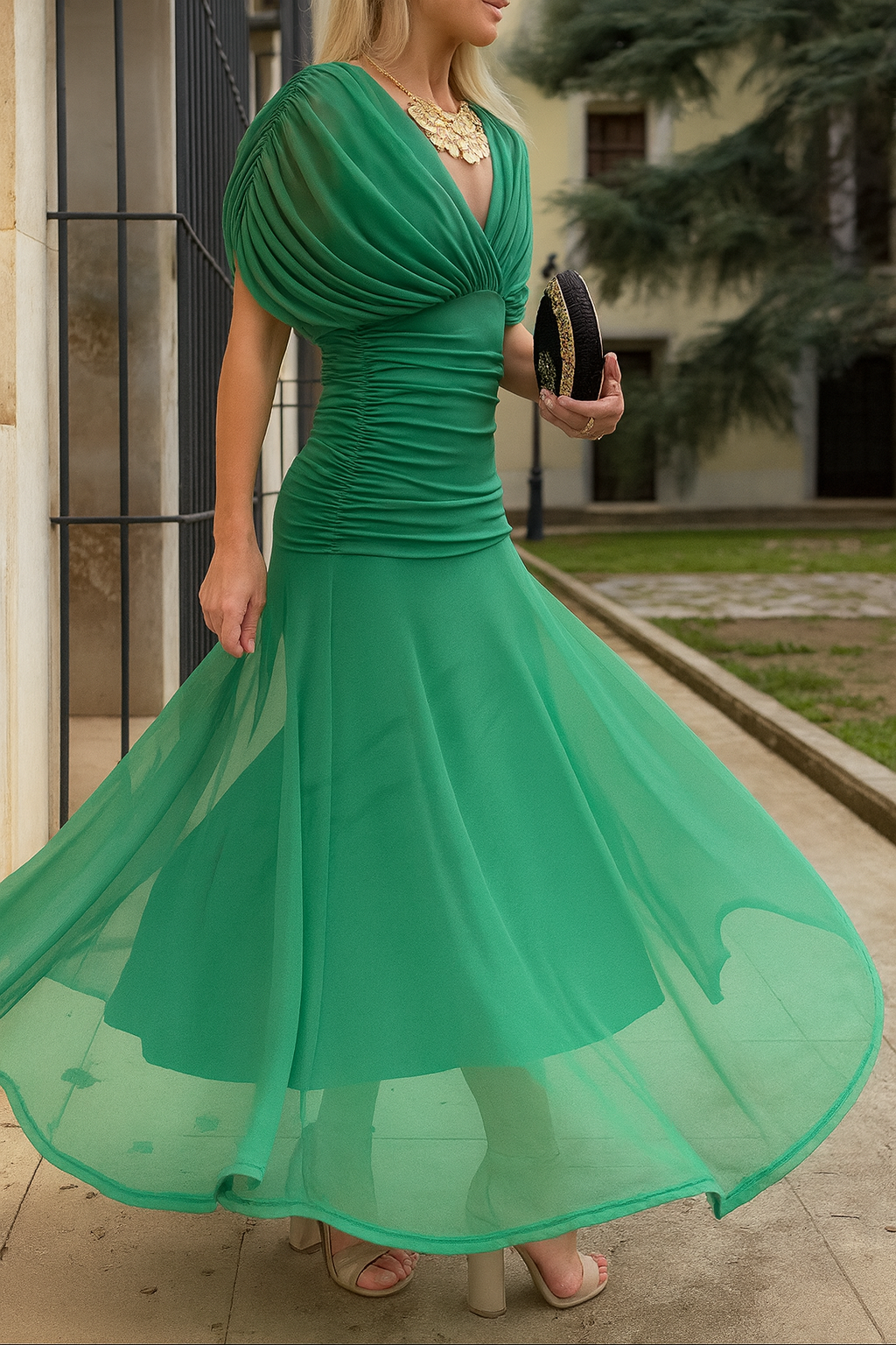 Chic women's evening dress made of delicate mesh with a unique diagonal collar.