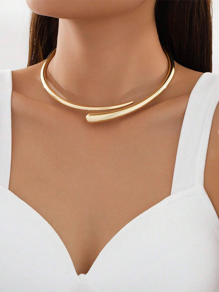 Elegant women's gold-tone water drop open choker necklace, a minimalist statement piece for modern jewelry lovers.