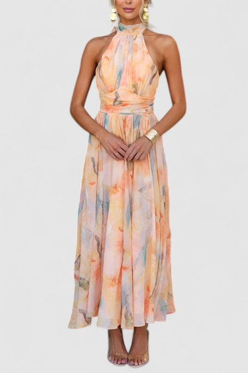 Flowy floral print halter neck maxi dress for women, ideal for summer vacation & evening wear.