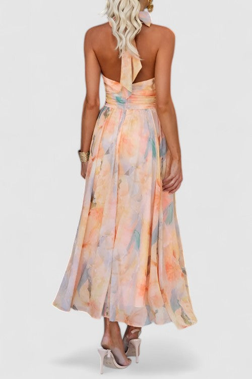 Chic sleeveless floral halter neck maxi dress, a stylish choice for summer elegance & events.