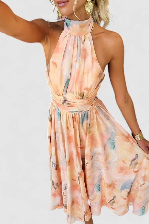 Vibrant floral print halter neck maxi dress for women, versatile for summer parties or vacation.