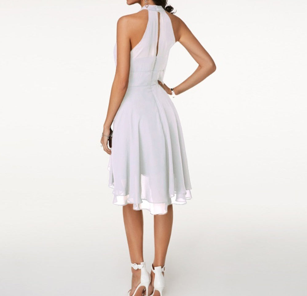 Graceful midi length cocktail dress with a sophisticated halter top
