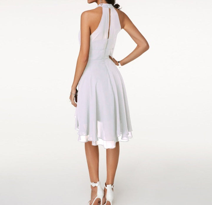 Graceful midi length cocktail dress with a sophisticated halter top