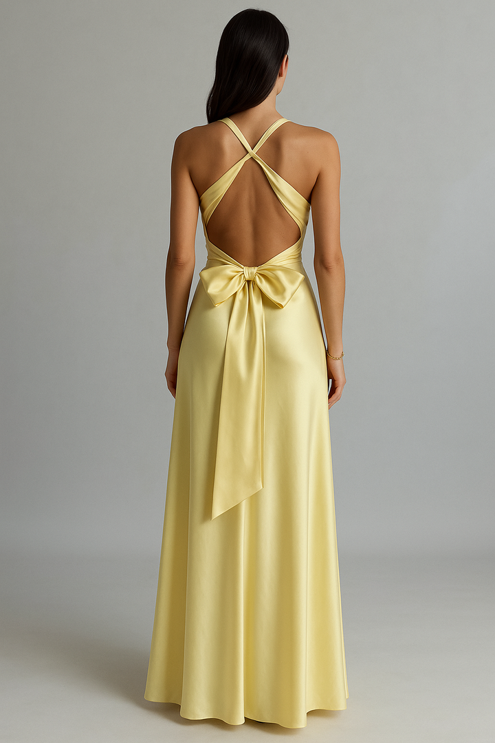 Stunning yellow halter maxi dress for women with open back. Ideal for prom, weddings & formal events.