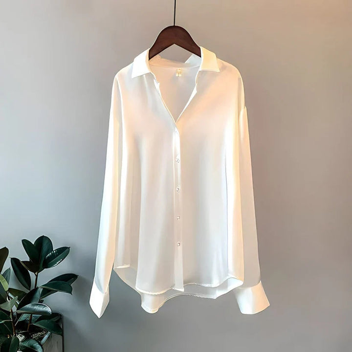 Chic jade green silk blouse for women, ideal for warm weather fashion.
