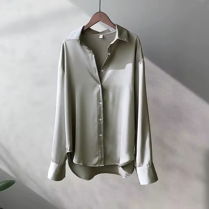 Versatile women's jade silk blouse, a must-have summer wardrobe essential.