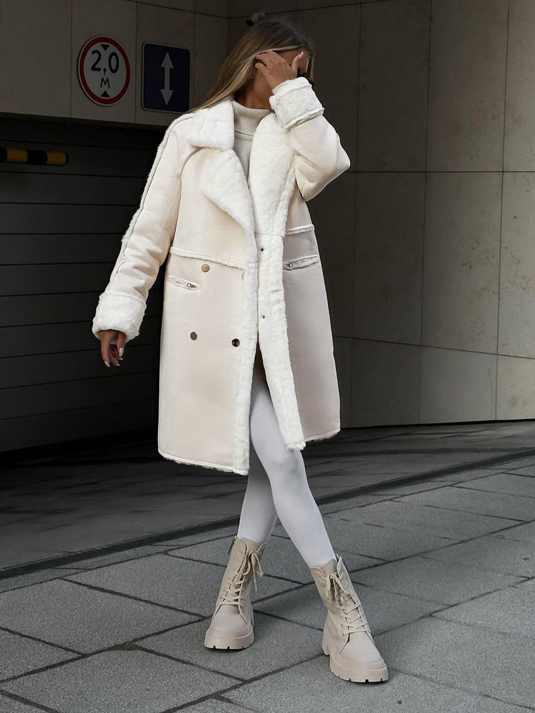 Elegant women's long beige polar fleece winter coat, Ava style, offering stylish warmth for office or casual wear.