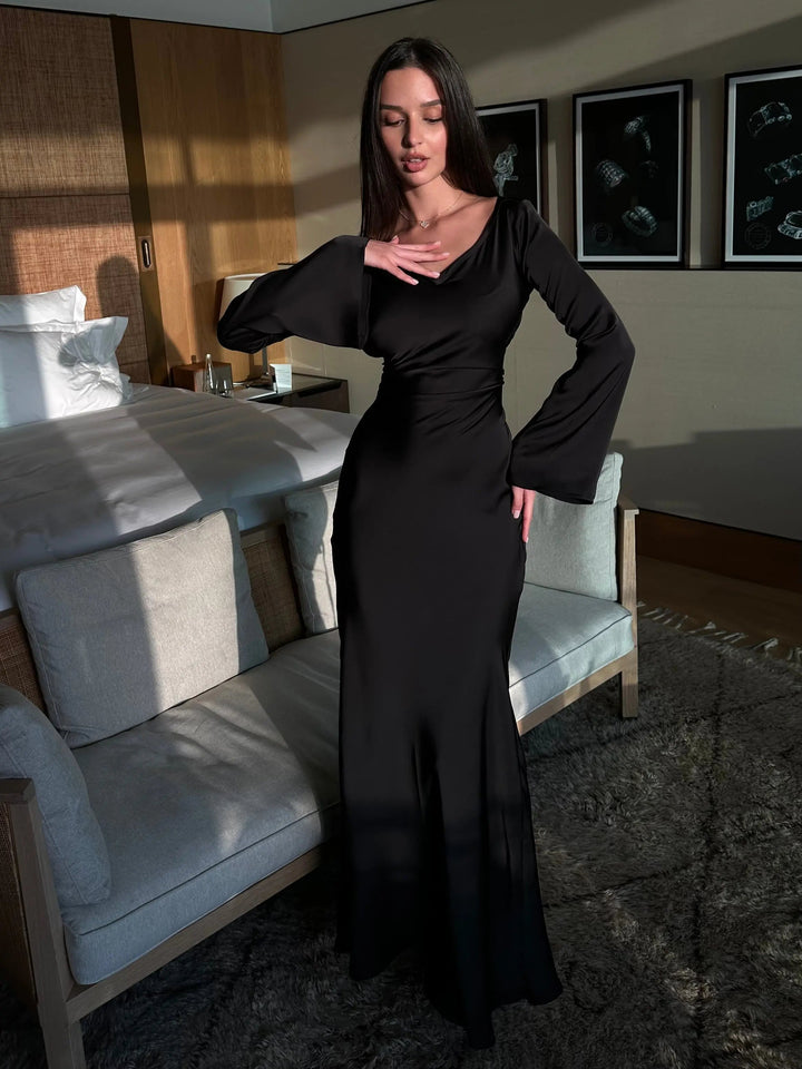 Detail shot of the neckline on a stylish long sleeve elegant maxi dress.