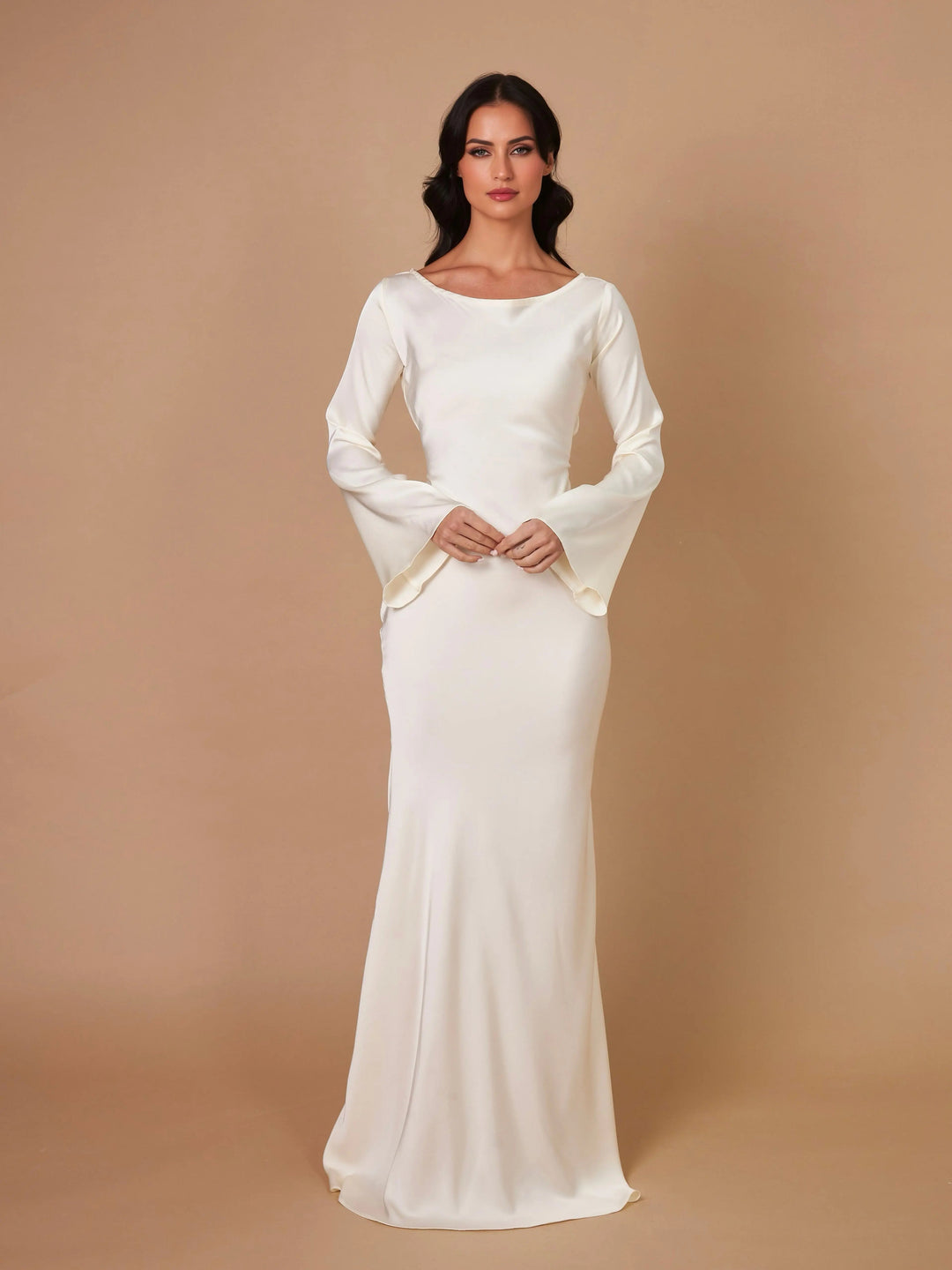 Side profile of a graceful long sleeve maxi dress, highlighting its elegant design.