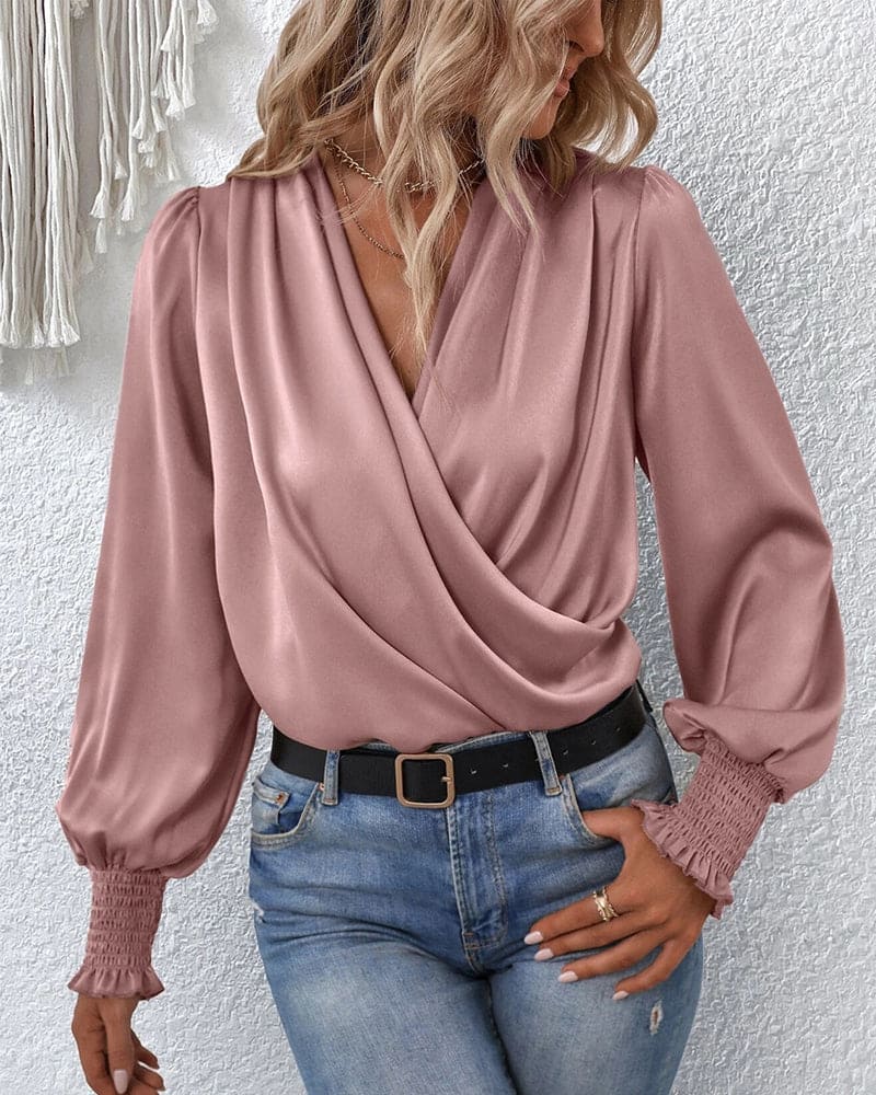 Comfortable & elegant women's long-sleeve wrap blouse. Versatile chic top, perfect for sophisticated fashion.