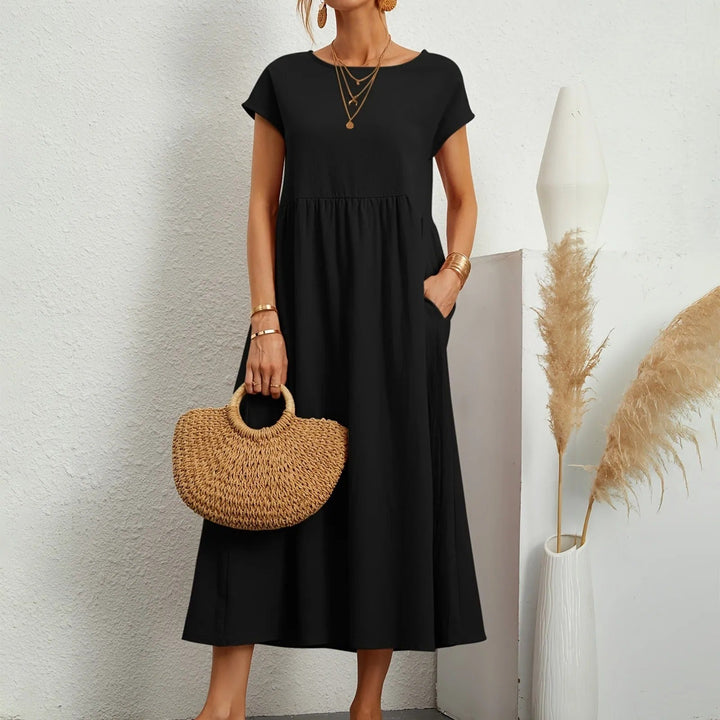 Versatile women's midi dress, ideal for day-to-night wear. Effortless elegant fashion with a flattering fit.