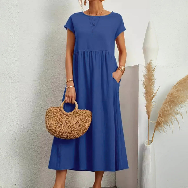Comfortable & flattering women's midi dress for sophisticated occasion wear. Classic day-to-night style.