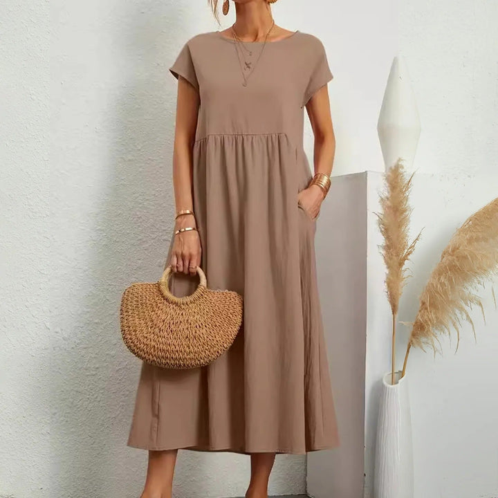 Sophisticated women's midi dress, designed for effortless style and a comfortable, flattering fit.