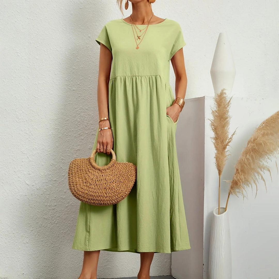 Elegant women's midi dress, perfect for sophisticated day-to-night style. Flattering & comfortable fit.