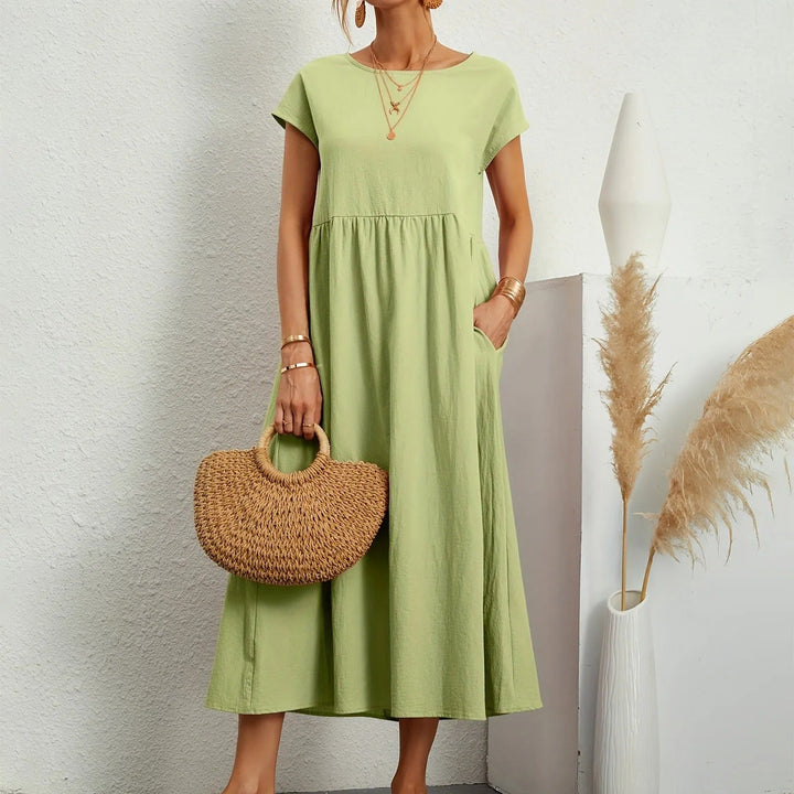 Elegant women's midi dress, perfect for sophisticated day-to-night style. Flattering & comfortable fit.