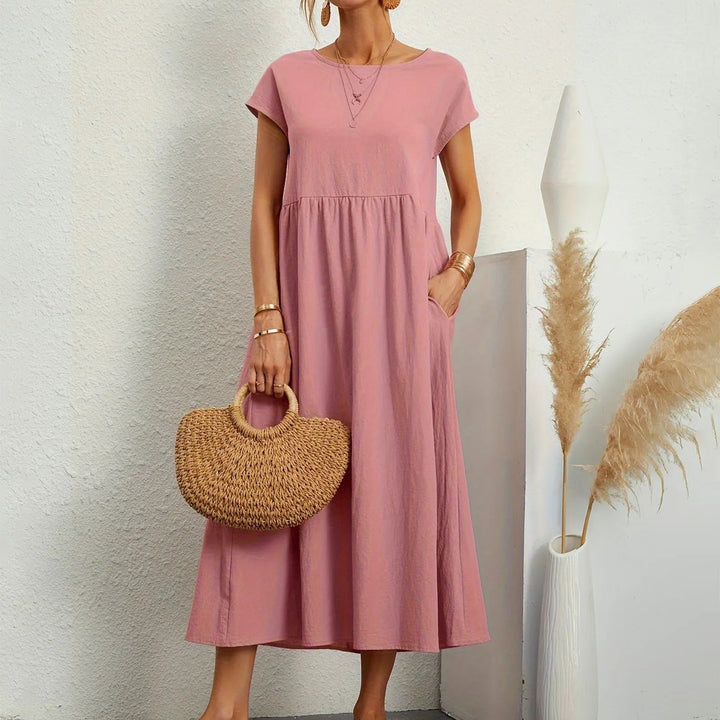 Comfortable women's midi dress with an elegant design, suitable for classic fashion & occasion wear.