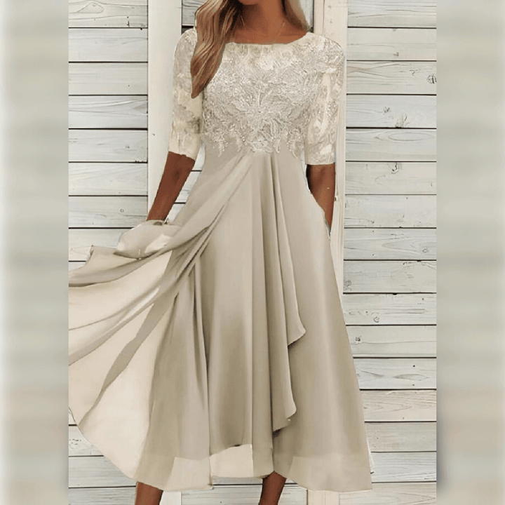 Flowy midi party dress for women, an elegant evening dress with a detailed lace bodice, perfect for formal events.