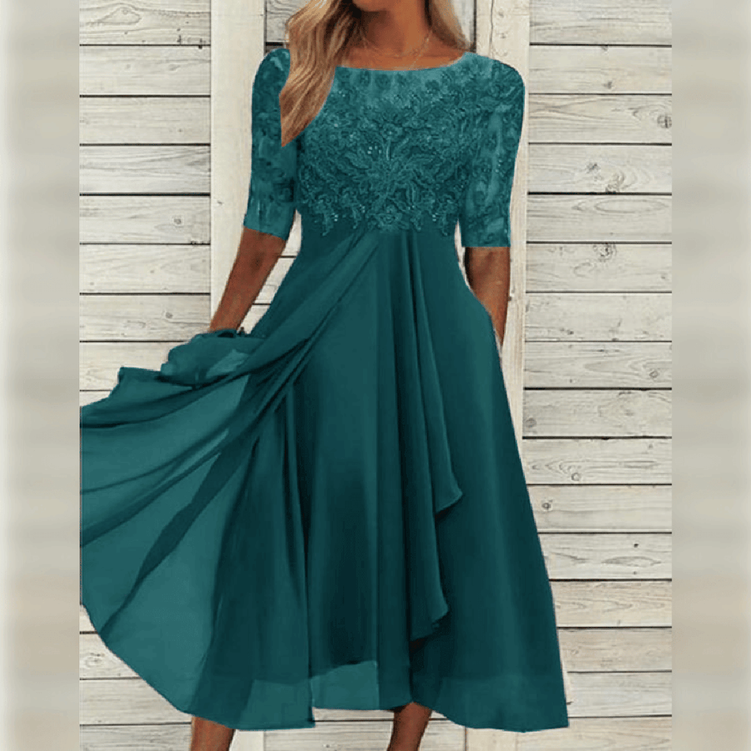 Elegant women's party midi dress featuring a beautiful lace bodice, perfect for cocktail or formal evening events.