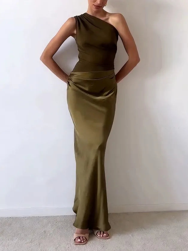 Luxurious women's one shoulder pleated evening gown, sophisticated formal wear for elegant events.