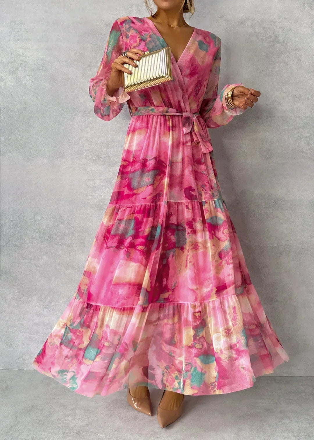 Chic women's summer evening maxi dress featuring a vibrant floral wrap design.