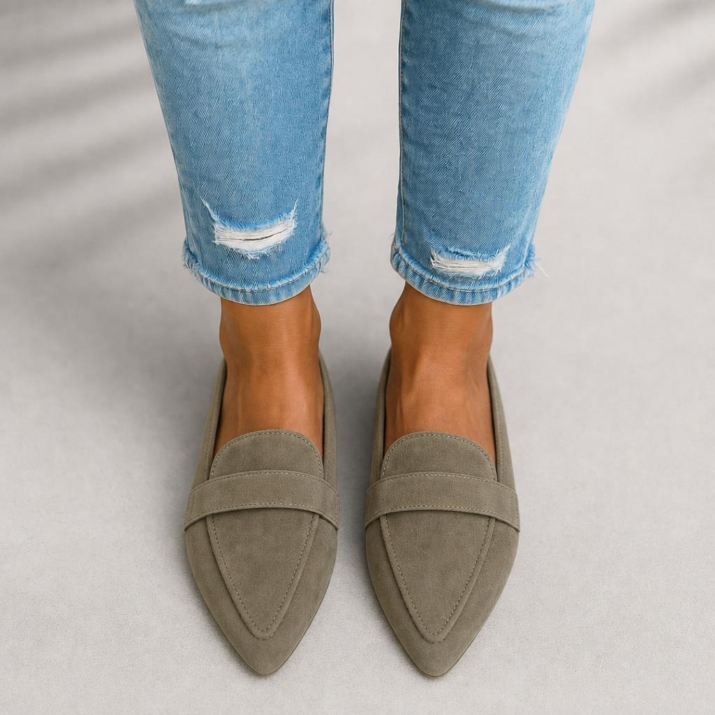 Classic women's pointed toe slip-on loafers. Comfortable flat shoes for elegant casual or formal looks.