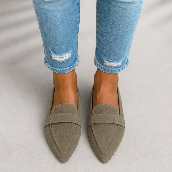 Classic women's pointed toe slip-on loafers. Comfortable flat shoes for elegant casual or formal looks.