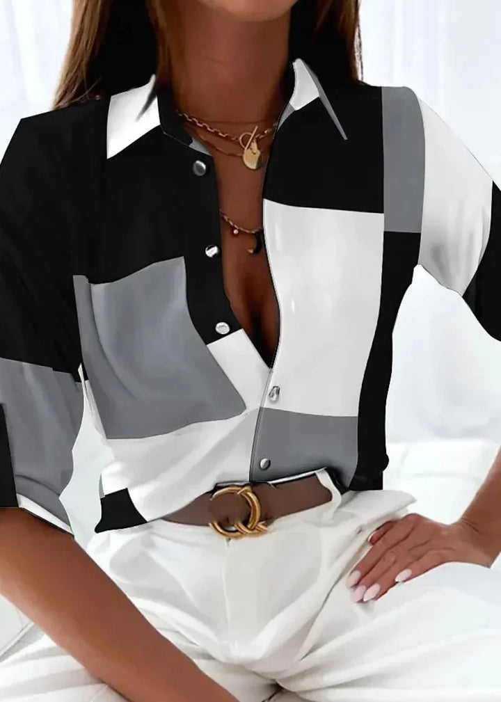 Chic women's modern printed blouse, a versatile contemporary fashion top offering effortless sophistication.