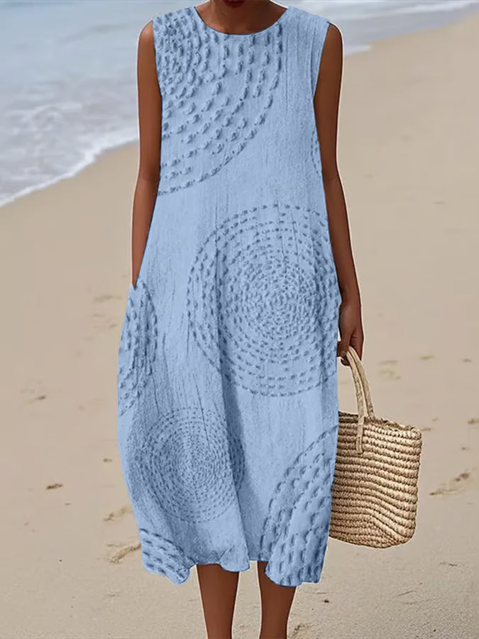 Flowy women's maxi dress with unique texture, ideal for summer elegance.