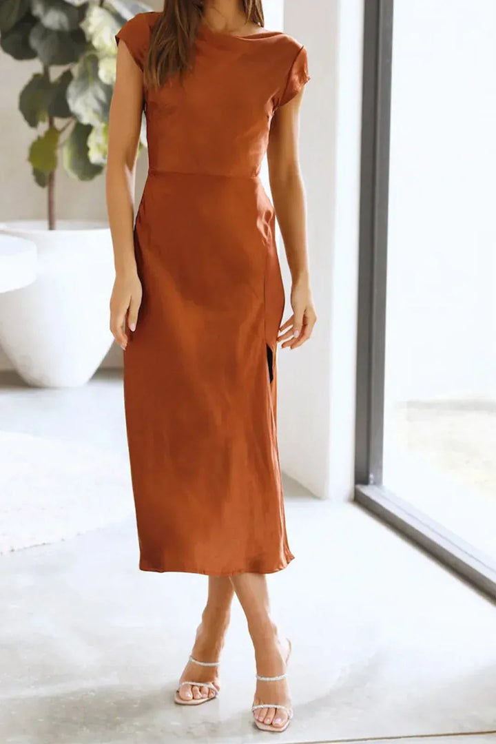 Sophisticated women's midi slip dress with capped sleeves, perfect for elegant formal & cocktail party events.