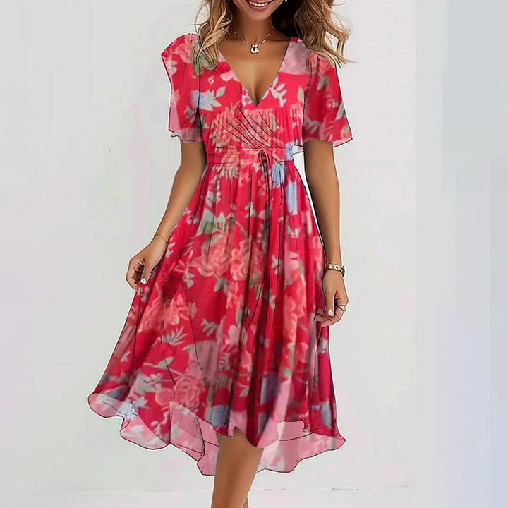 Flowy elegant women's midi dress, designed for warm weather style. A flattering and feminine addition to summer wardrobe.