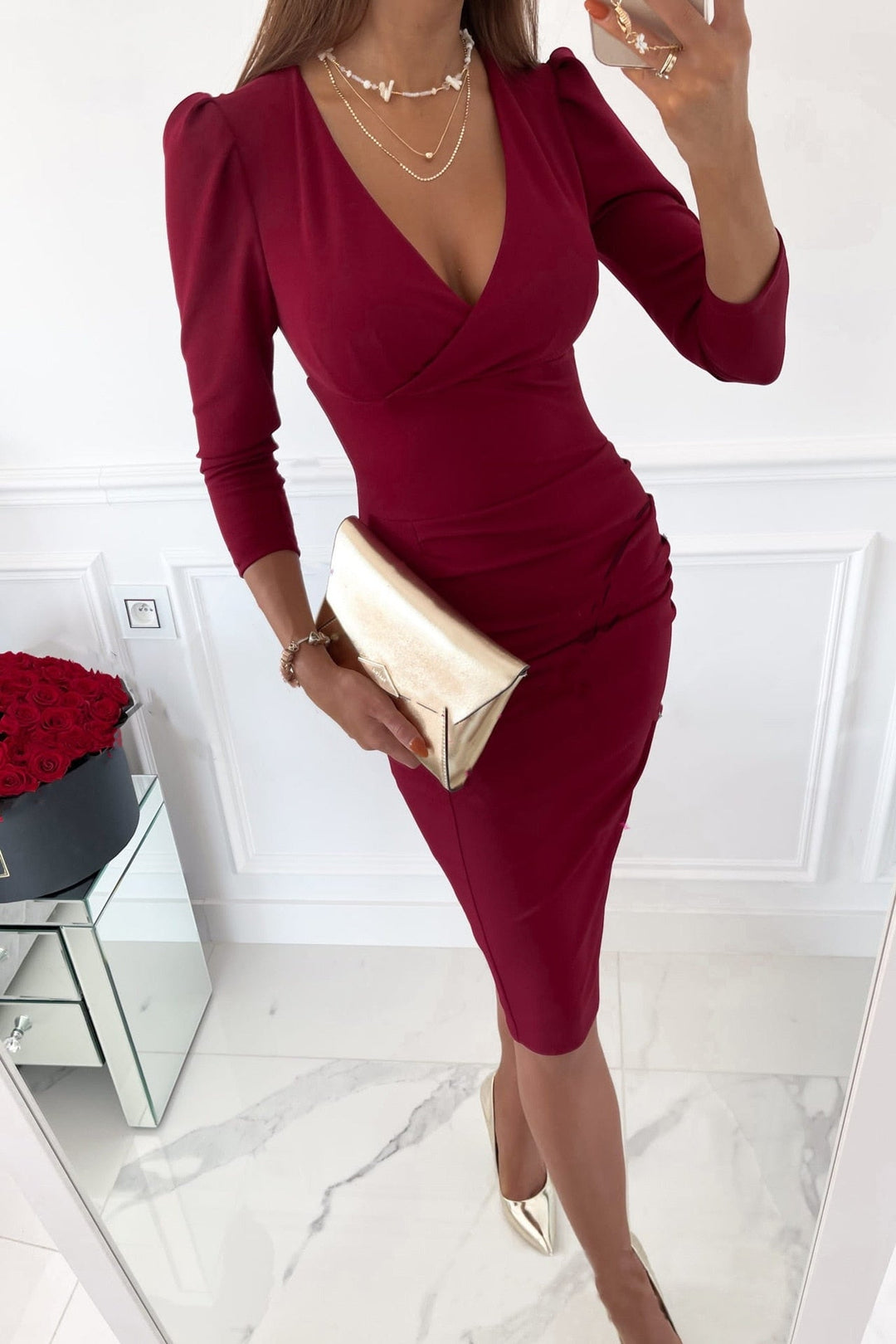 Stylish V-neck bodycon dress for women, ideal for cocktail parties & evening wear. Fitted & elegant.