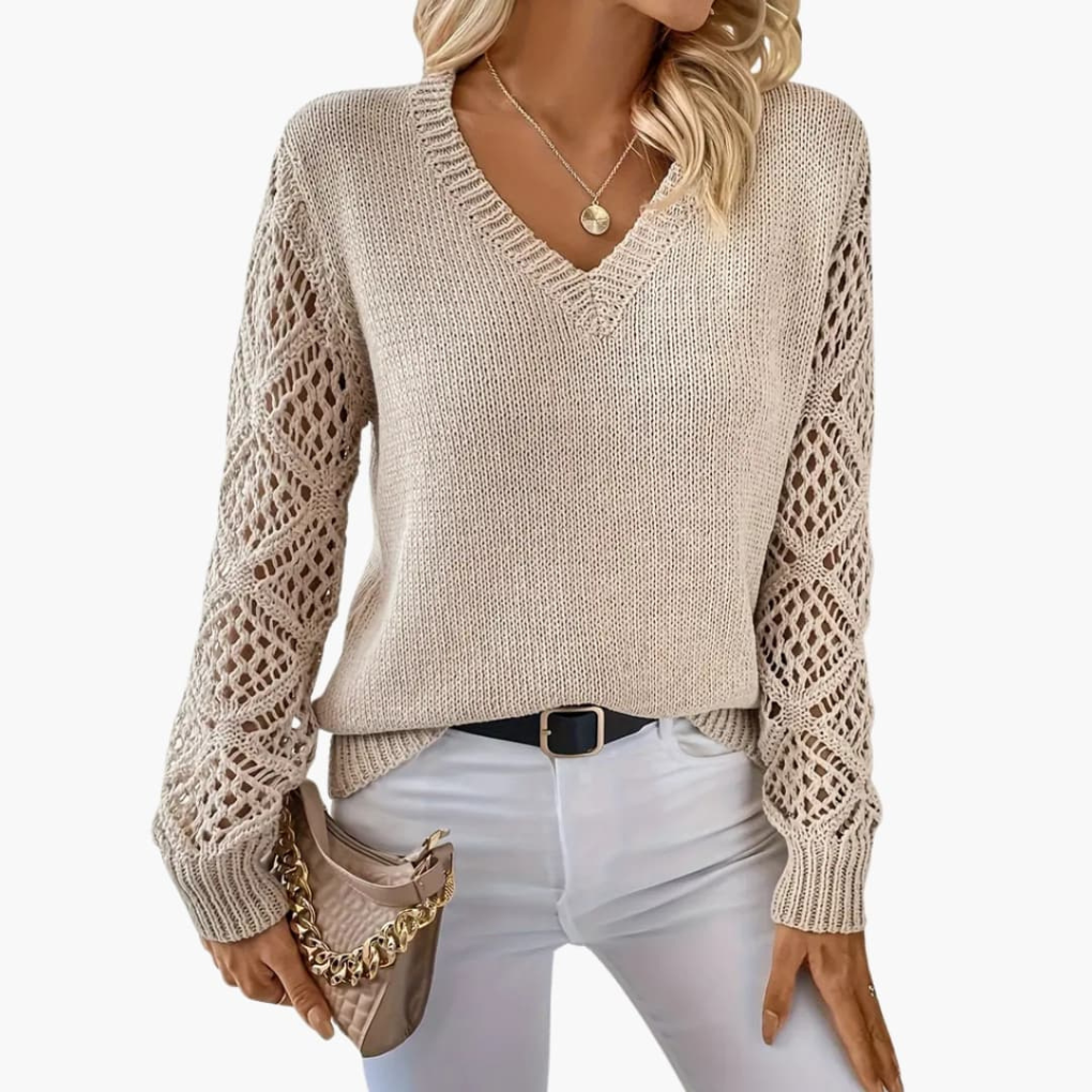 Elegant women's V-neck long sleeve pullover, perfect for casual or layering. Soft textured knit for everyday style.