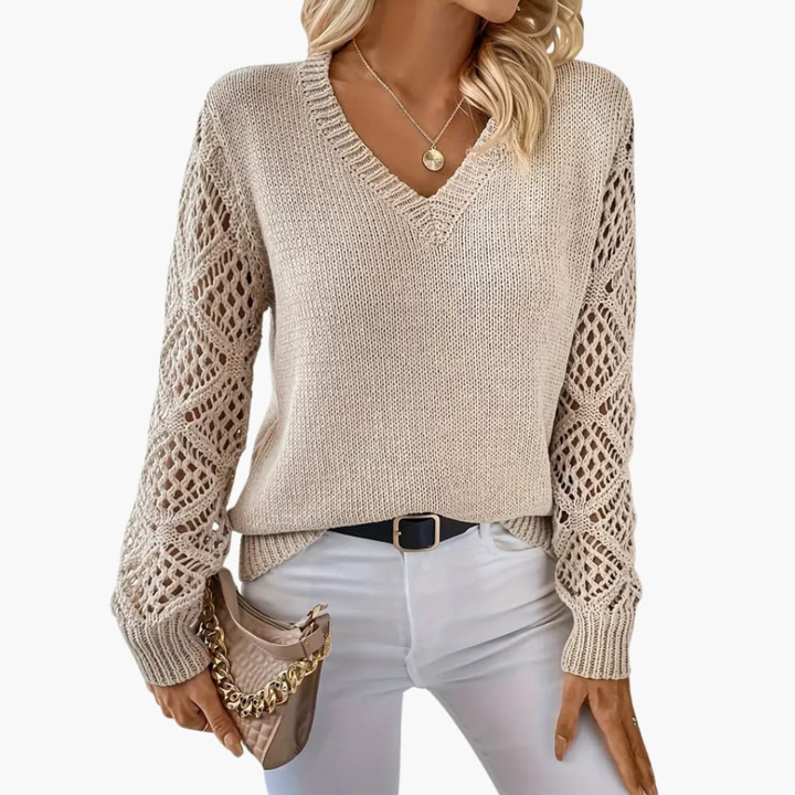 Elegant women's V-neck long sleeve pullover, perfect for casual or layering. Soft textured knit for everyday style.