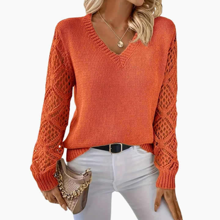 Cozy women's V-neck long sleeve pullover. Textured, soft knit offers comfort & chic style for everyday wear.