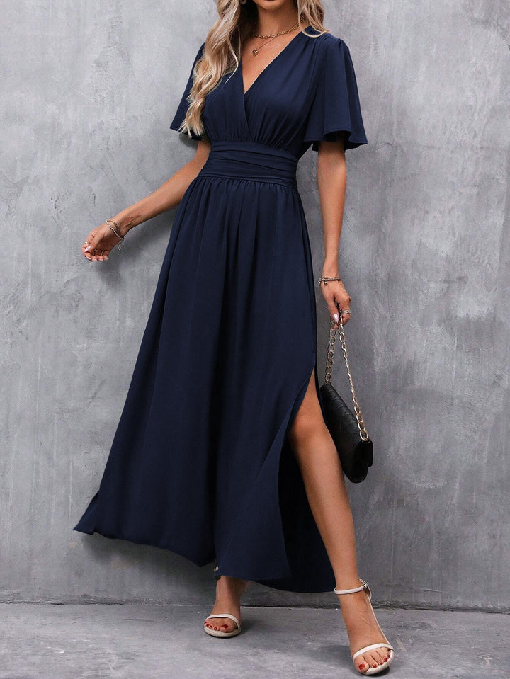 Women's elegant maxi dress featuring a V-neck, flutter sleeves, and empire waist. Ideal for summer or parties.