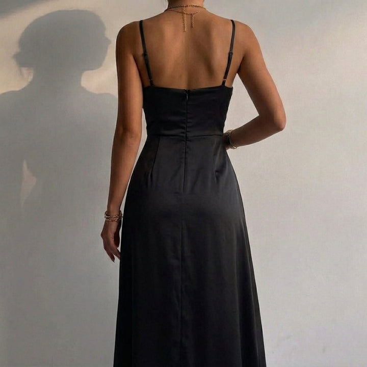A graceful women's midi dress with a deep V-neck and a daring thigh slit.