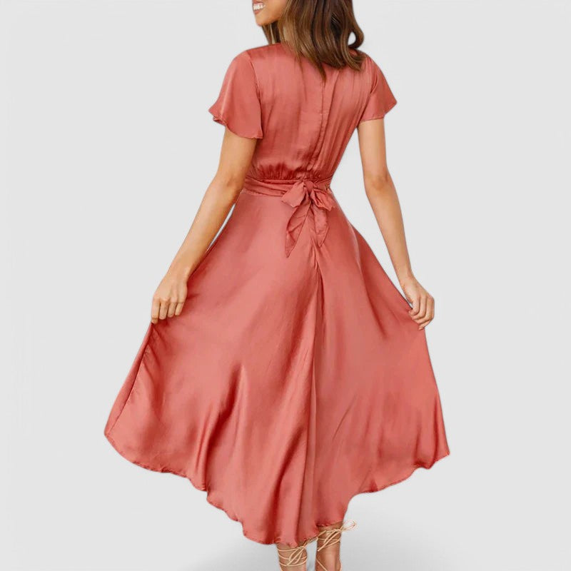 Sophisticated women's formal midi dress with a V-neck wrap and short sleeves, ideal for evening wear & special occasions.