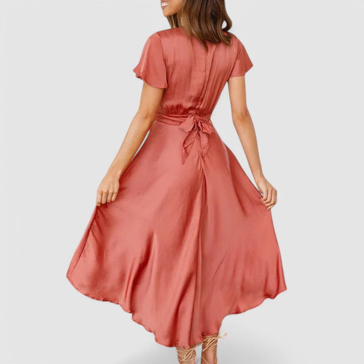 Sophisticated women's formal midi dress with a V-neck wrap and short sleeves, ideal for evening wear & special occasions.