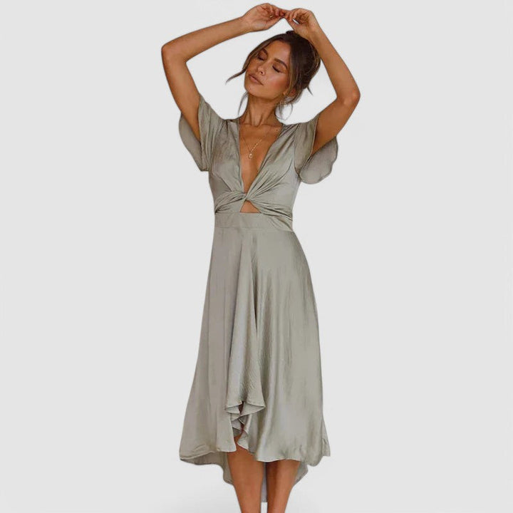 Stylish women's cocktail party V-neck wrap midi dress. Elegant formal wear with short sleeves & a flattering fit.