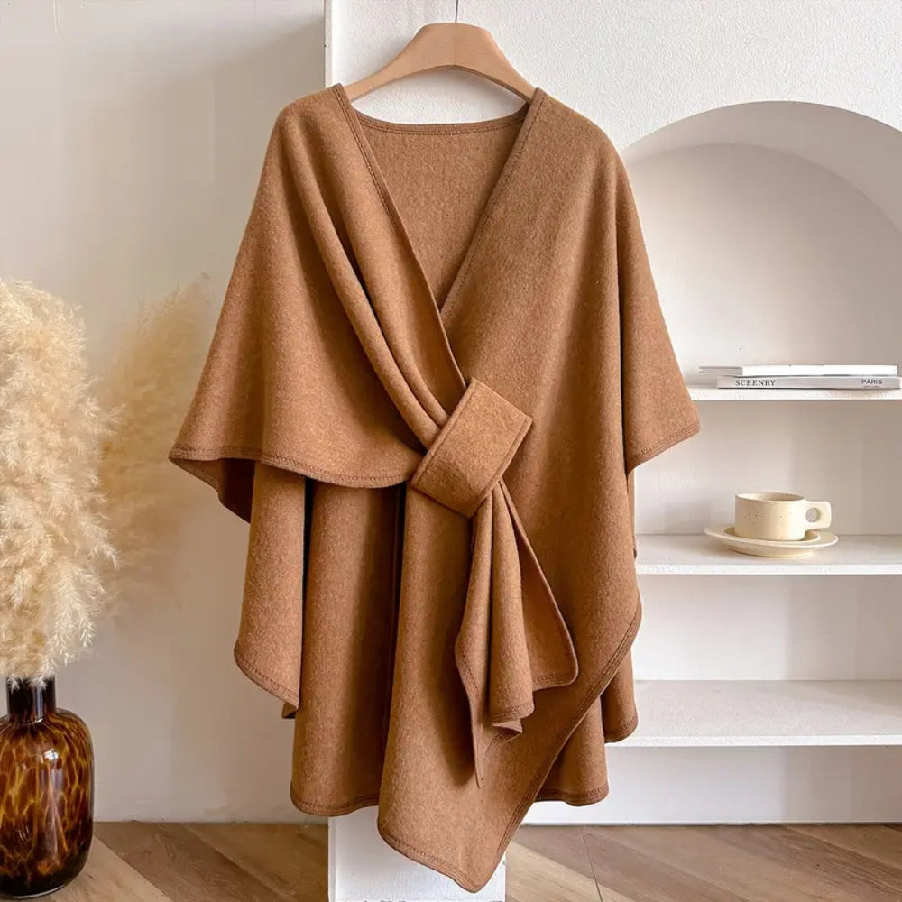 Versatile women's outerwear: elegant poncho with scarf detail