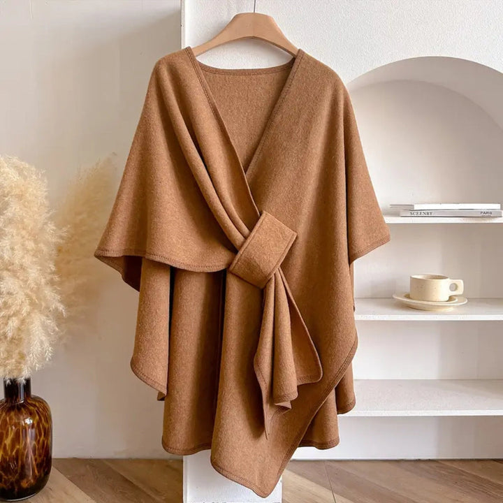Versatile women's outerwear: elegant poncho with scarf detail