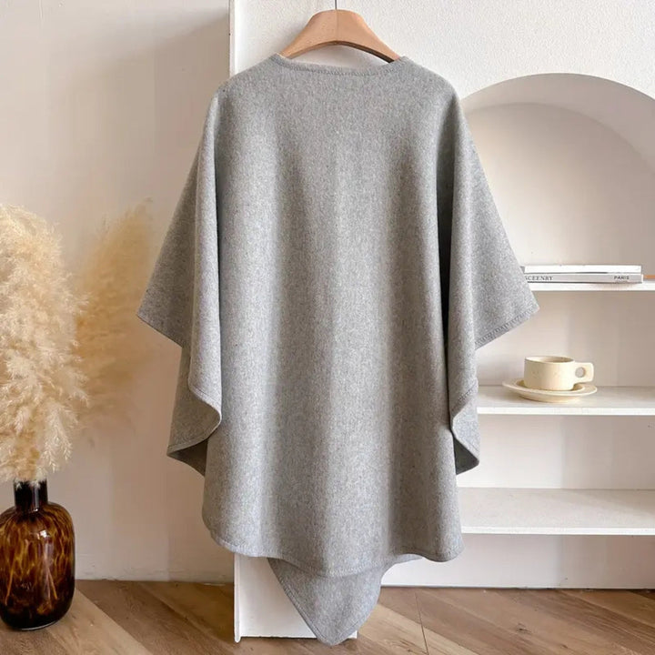 Cozy and chic: women's luxurious winter poncho with scarf